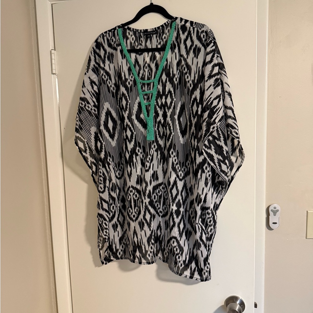 Chic Black and White Geometric swim coverup with Green Accents.